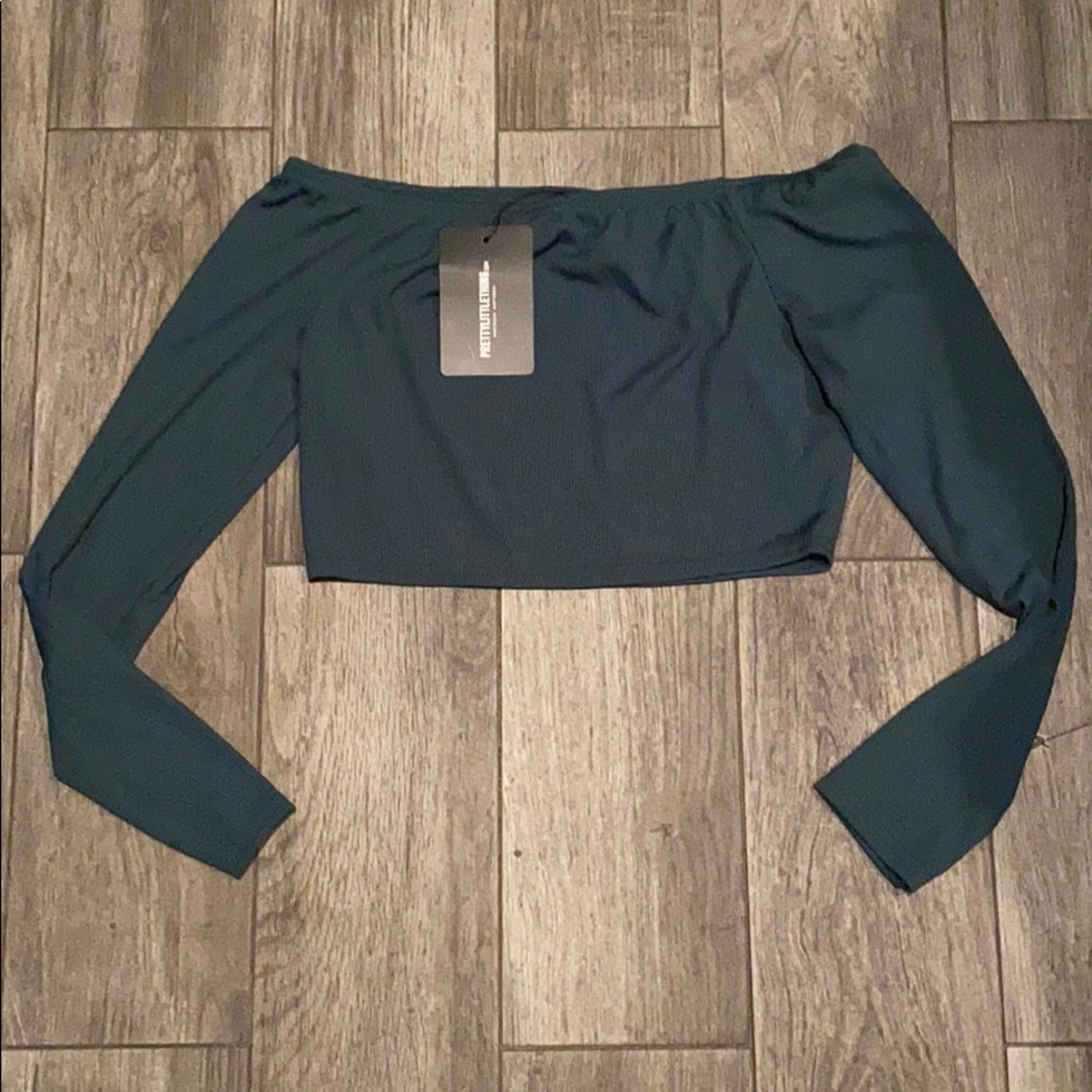 Emerald green ribbed long sleeve crop top
